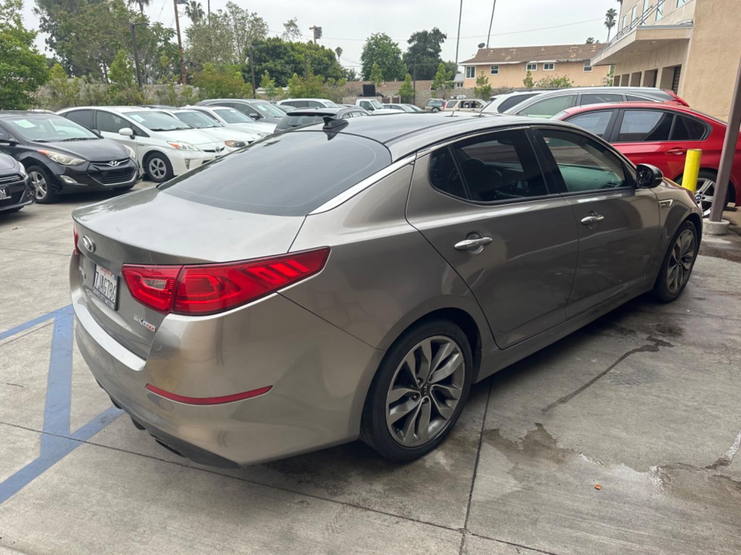 2014 Gray /BLACK Kia Optima SX Turbo (5XXGR4A62EG) with an 2.0L L4 DOHC 16V TURBO engine, 6-Speed Automatic transmission, located at 30 S. Berkeley Avenue, Pasadena, CA, 91107, (626) 248-7567, 34.145447, -118.109398 - New tires! Moon Roof! Nice Interior! Looks and drives good! Bad credit? We can help! We are the bank. All our cars are thoroughly inspected and reconditioned by our technicians. FREE CARFAX report. Stop by or call to speak with our friendly staff. Whether you have bad credit, no credit, bankruptcy, - Photo#4